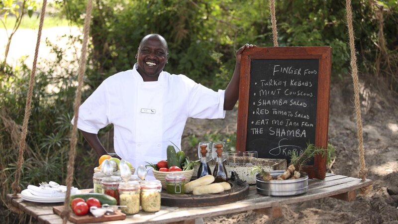 Tanzania-Serengeti NP-&Beyond-Kleins-Camp-fingerfood-set-up-chef